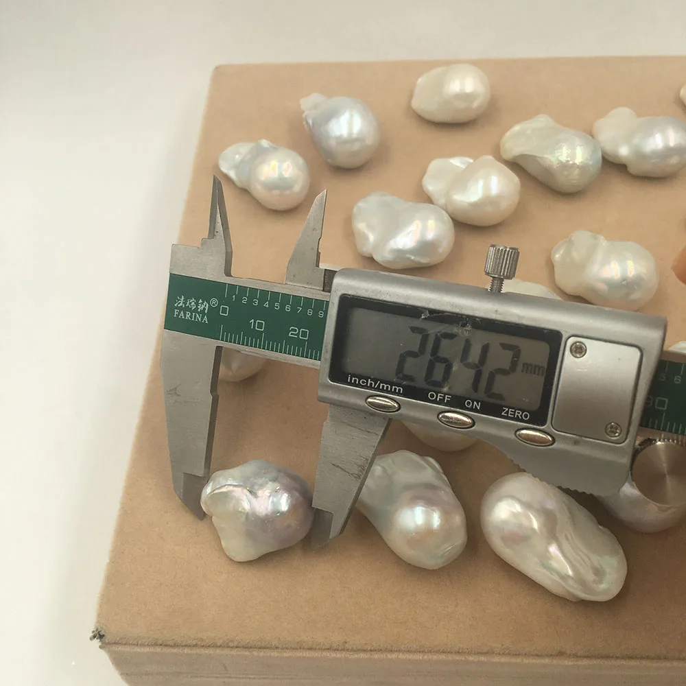 NEMOKAMAS PRISTATYMAS,aukštos kokybės AAA DIDŽIAUSIŲ BAROKO POBŪDŽIO prarasti perlas ,puse skylę, ilgis 26-35 MM